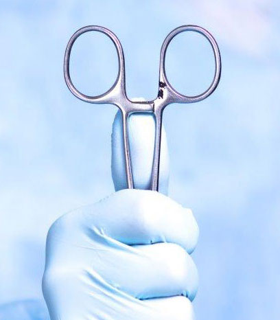 Surgical hand holding scissors with a pit in it